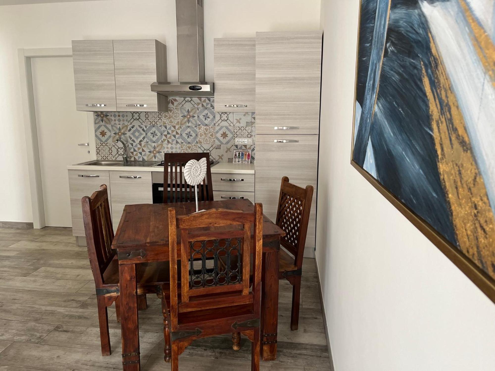Kennedy Family Apts Alguer Habitación foto