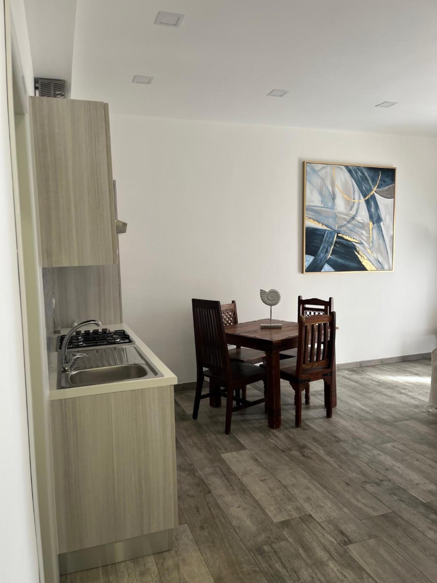 Kennedy Family Apts Alguer Habitación foto