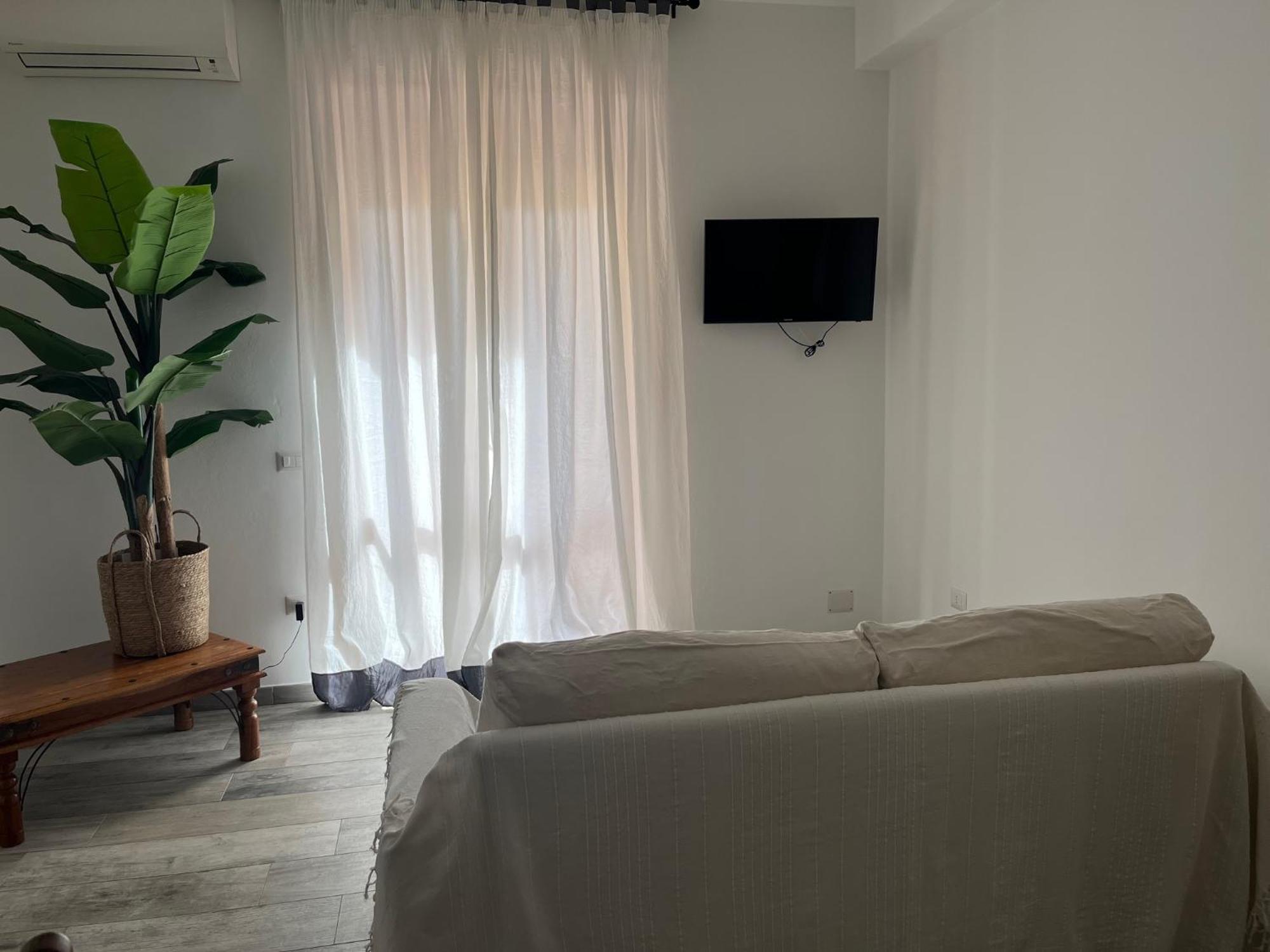 Kennedy Family Apts Alguer Habitación foto